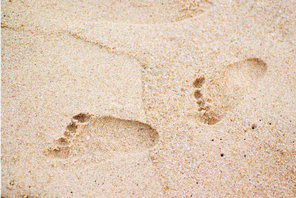Foot print for baby on beach sand